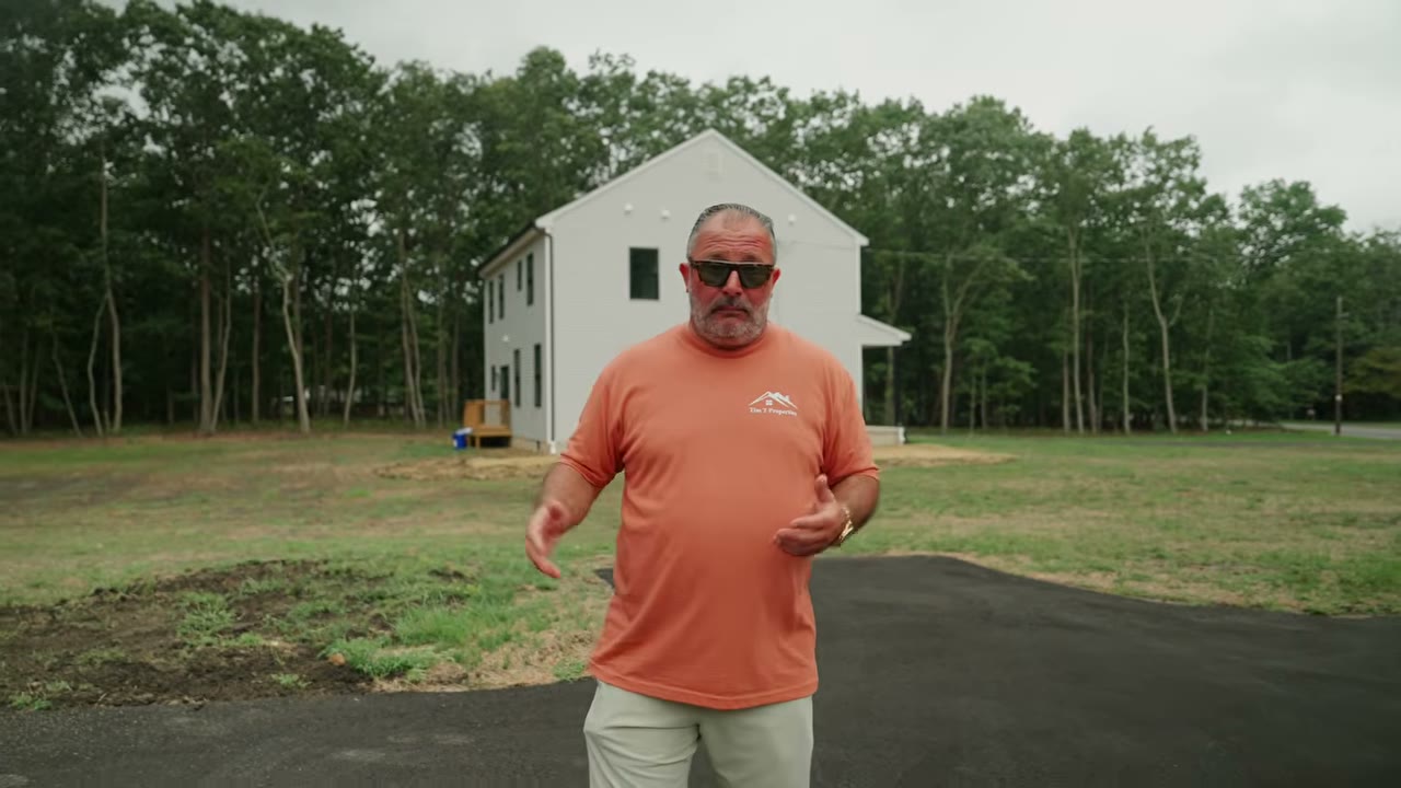 Tim walks the four new builds on Blue Anchor Road, a still from the video